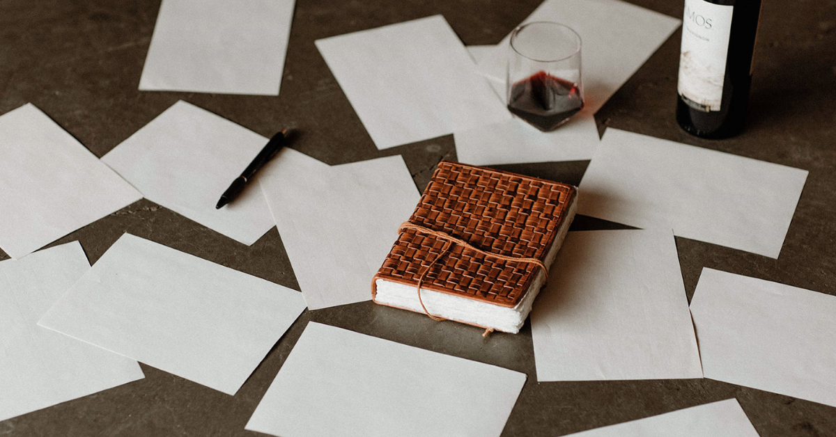papers spread across floor preparing for a website copy audit